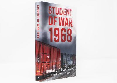 Student Of War 1968 book photo, showing a dynamic sky behind the red title and boxcars at the bottom