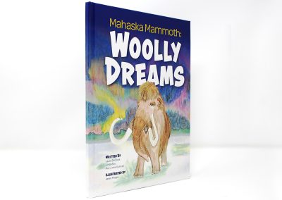 Woolly Dreams book photo, showing an illustrated woolly mammoth at the bottom with the northern lights in the background