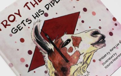 Troy the Llama graduates high school in second children’s book by Oskaloosa author